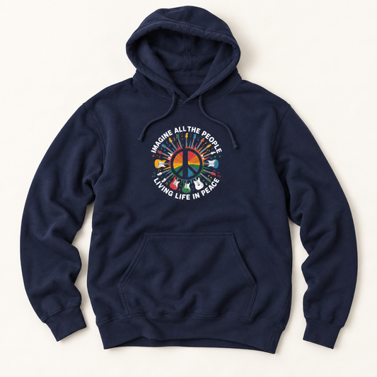 A navy blue pullover hoodie with a colorful peace sign graphic on the chest, featuring the text 'IMAGINE ALL THE PEOPLE LIVING LIFE IN PEACE' and various peace-themed flags, laid flat against a light cream background.