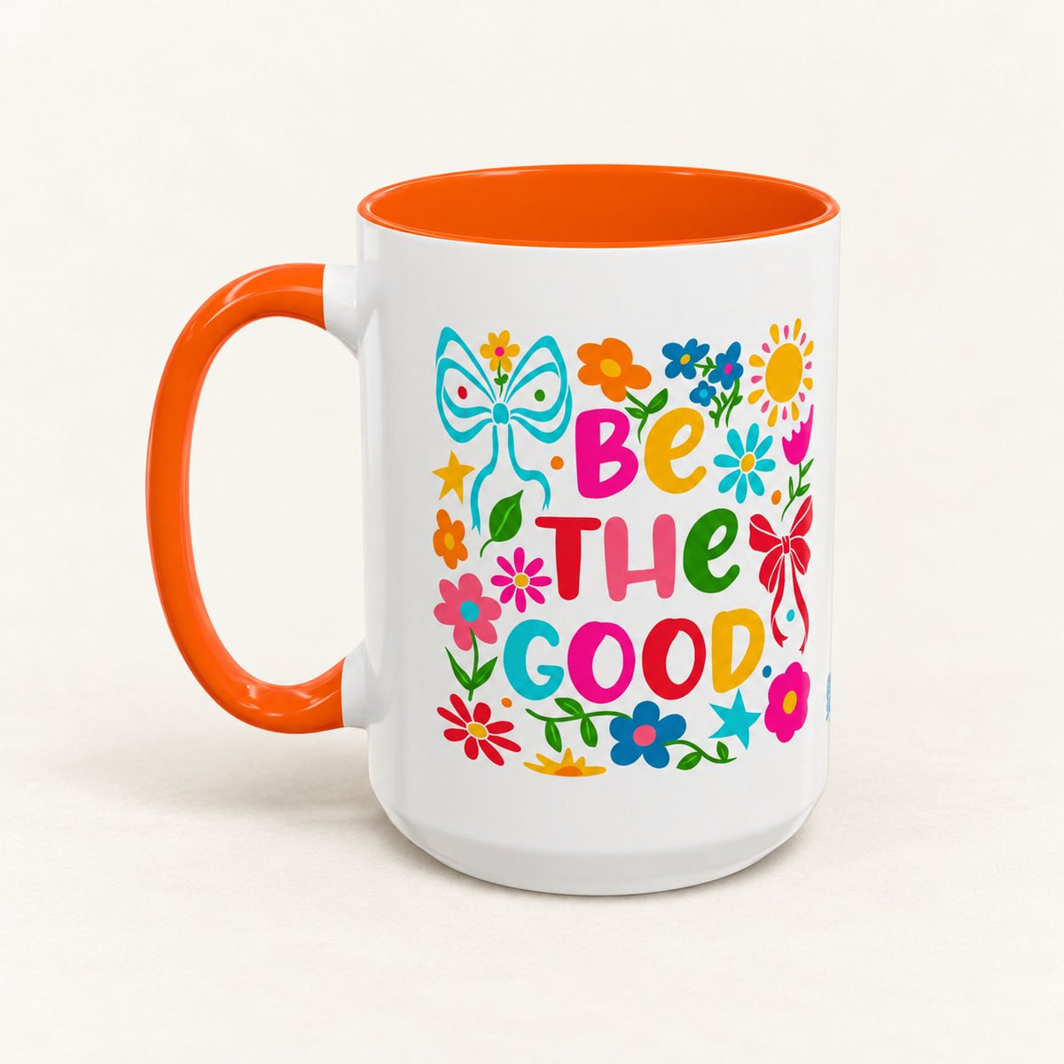 Be the Good Floral Coffee Mug on warm off-white background