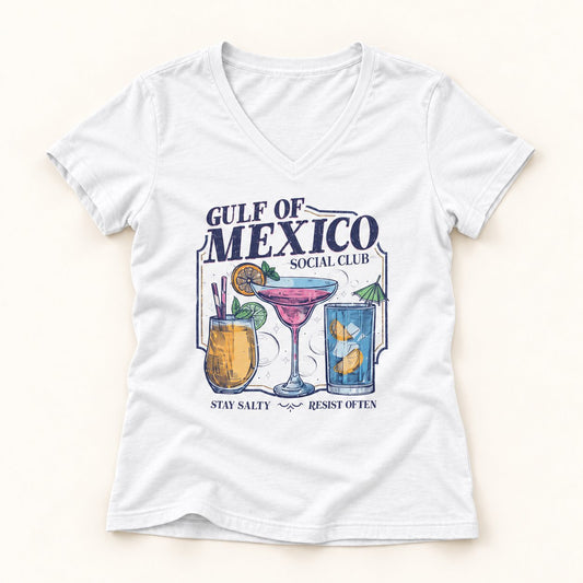Gulf of Mexico Beach V-Neck T-Shirt in White, flat lay on warm off-white background