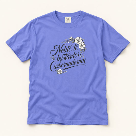 Nolite Te Bastardes Carborundum T-Shirt, product photo on warm off-white background
