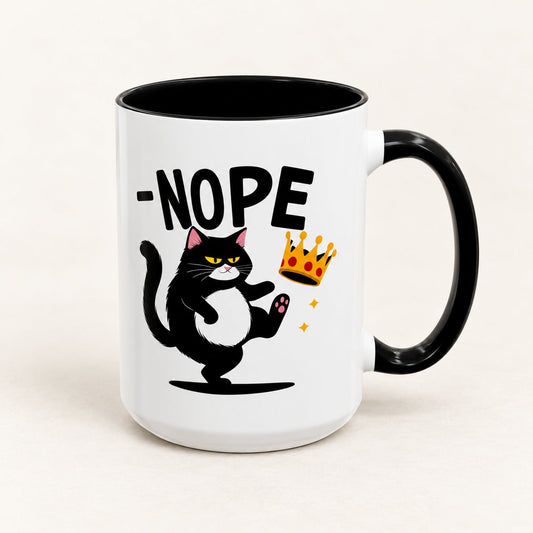 Nope No Kings Black Cat Coffee Mug on warm off-white background