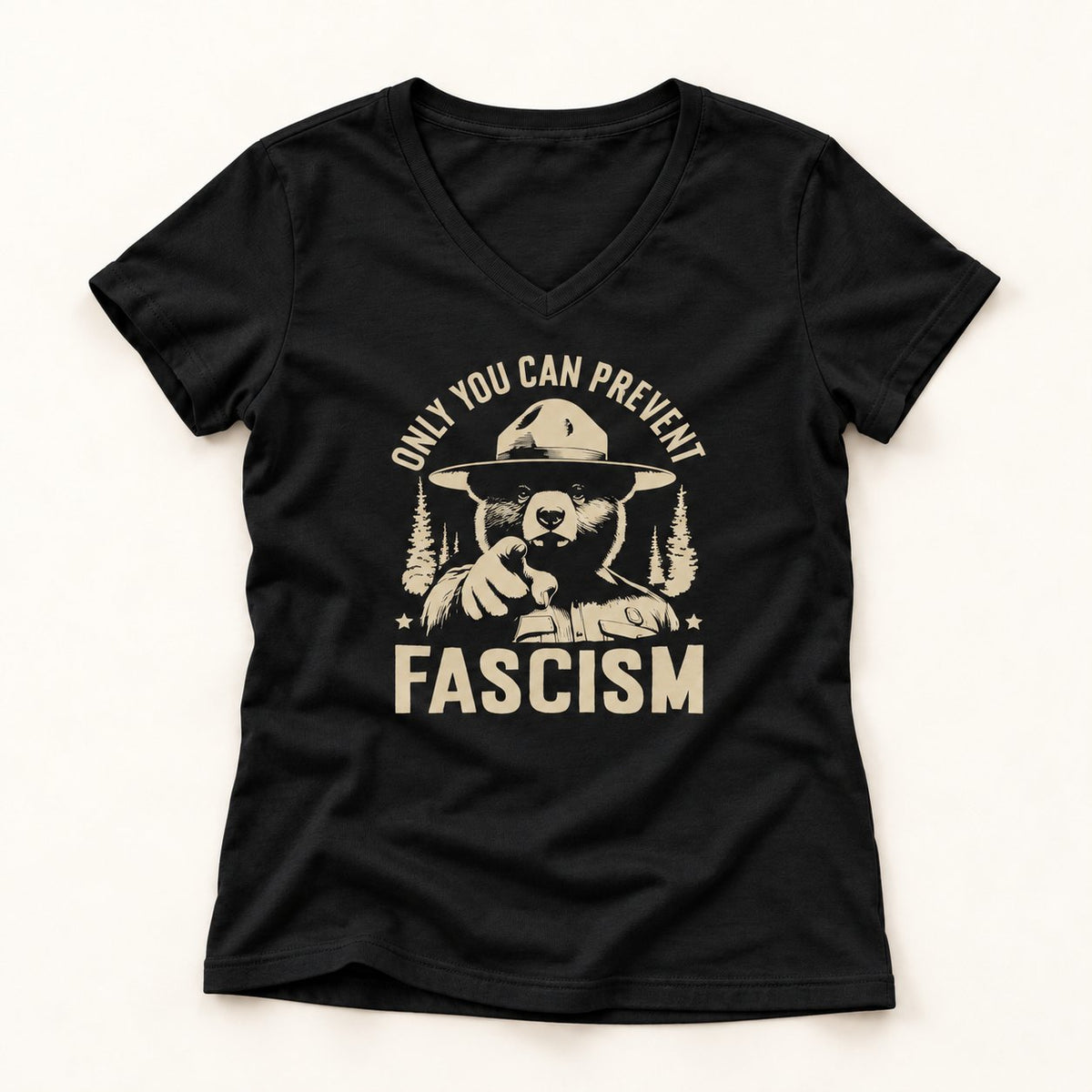 Only You Can Prevent Fascism V-Neck T-Shirt in Black, flat lay on warm off-white background