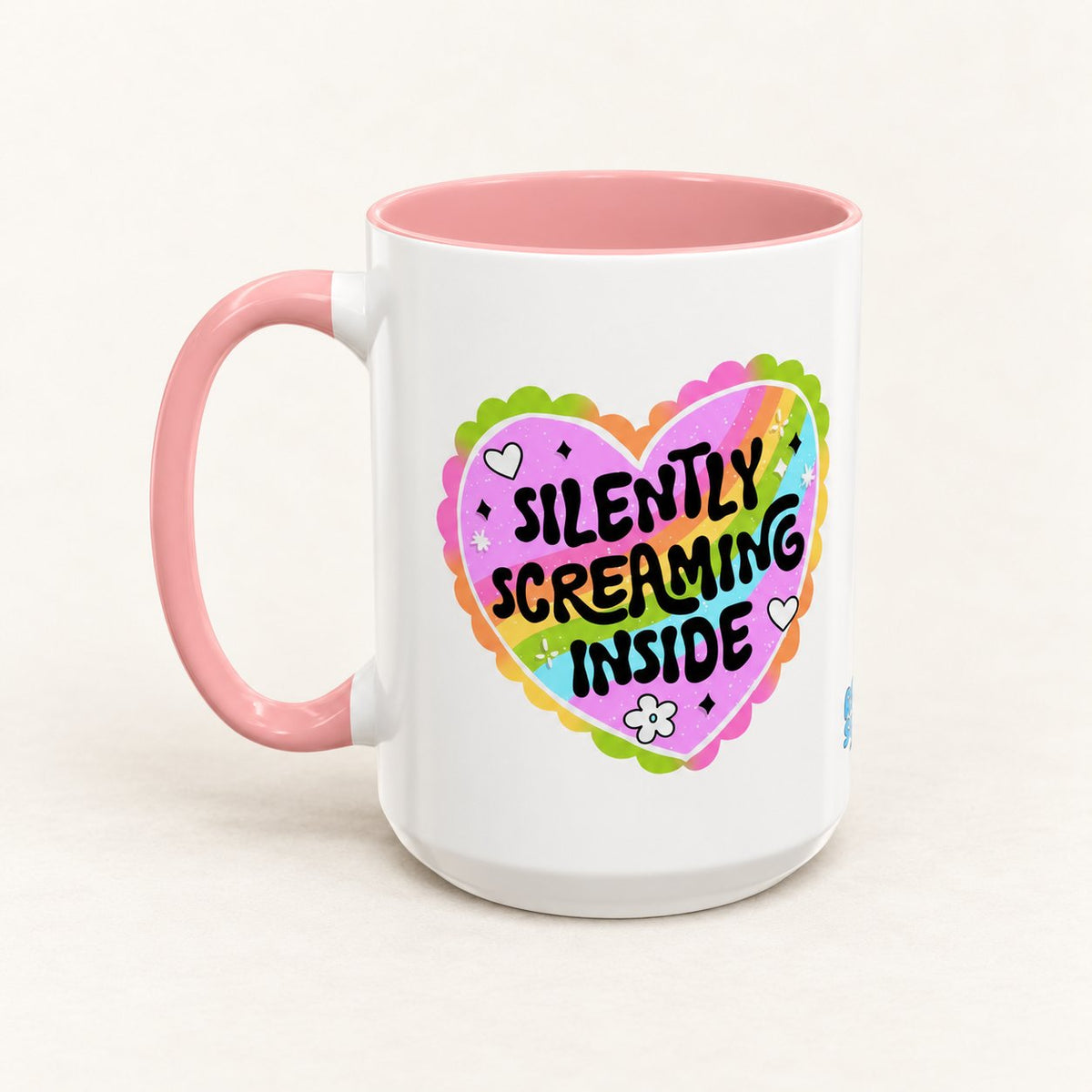Silently Screaming Inside Coffee Mug on warm off-white background