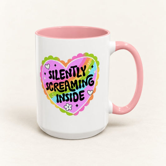 Silently Screaming Inside Coffee Mug on warm off-white background