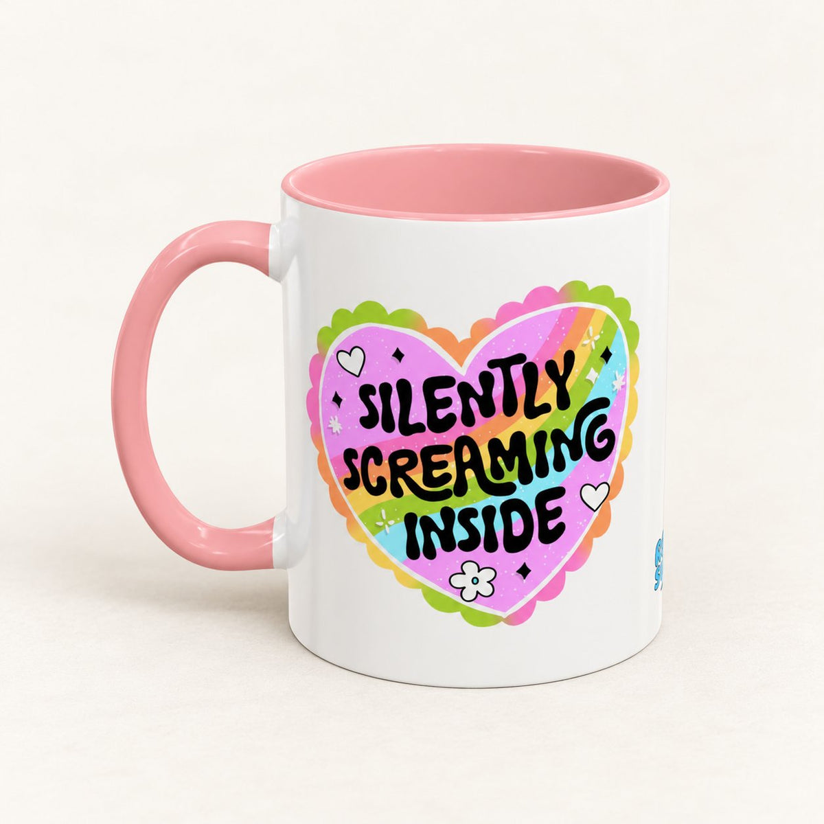 Silently Screaming Inside Coffee Mug on warm off-white background
