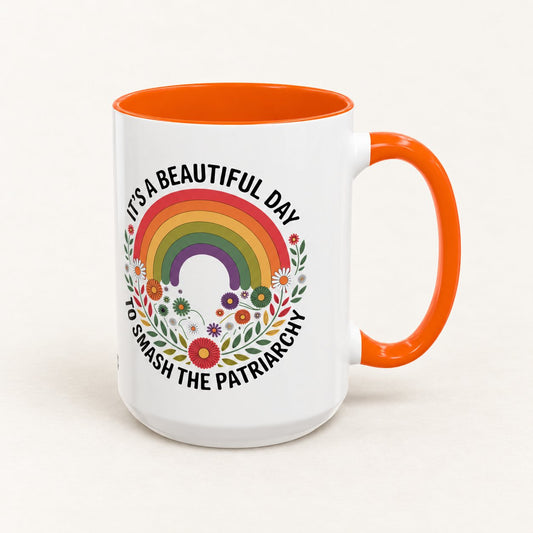 It's a Beautiful Day to Smash the Patriarchy Coffee Mug, 15 oz, on a warm off-white background