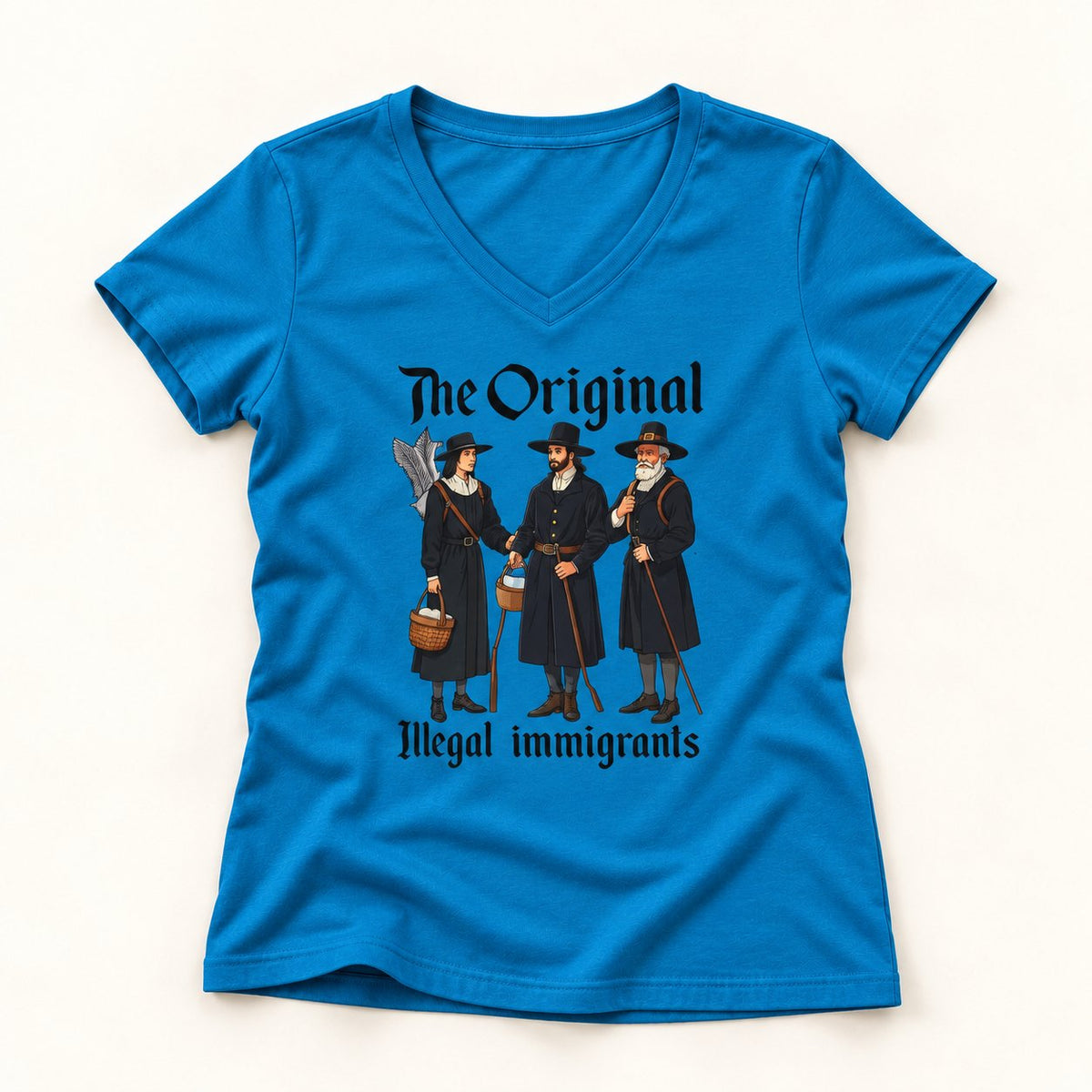 The Original Illegal Immigrants V-Neck T-Shirt in Sapphire, flat lay on warm off-white background