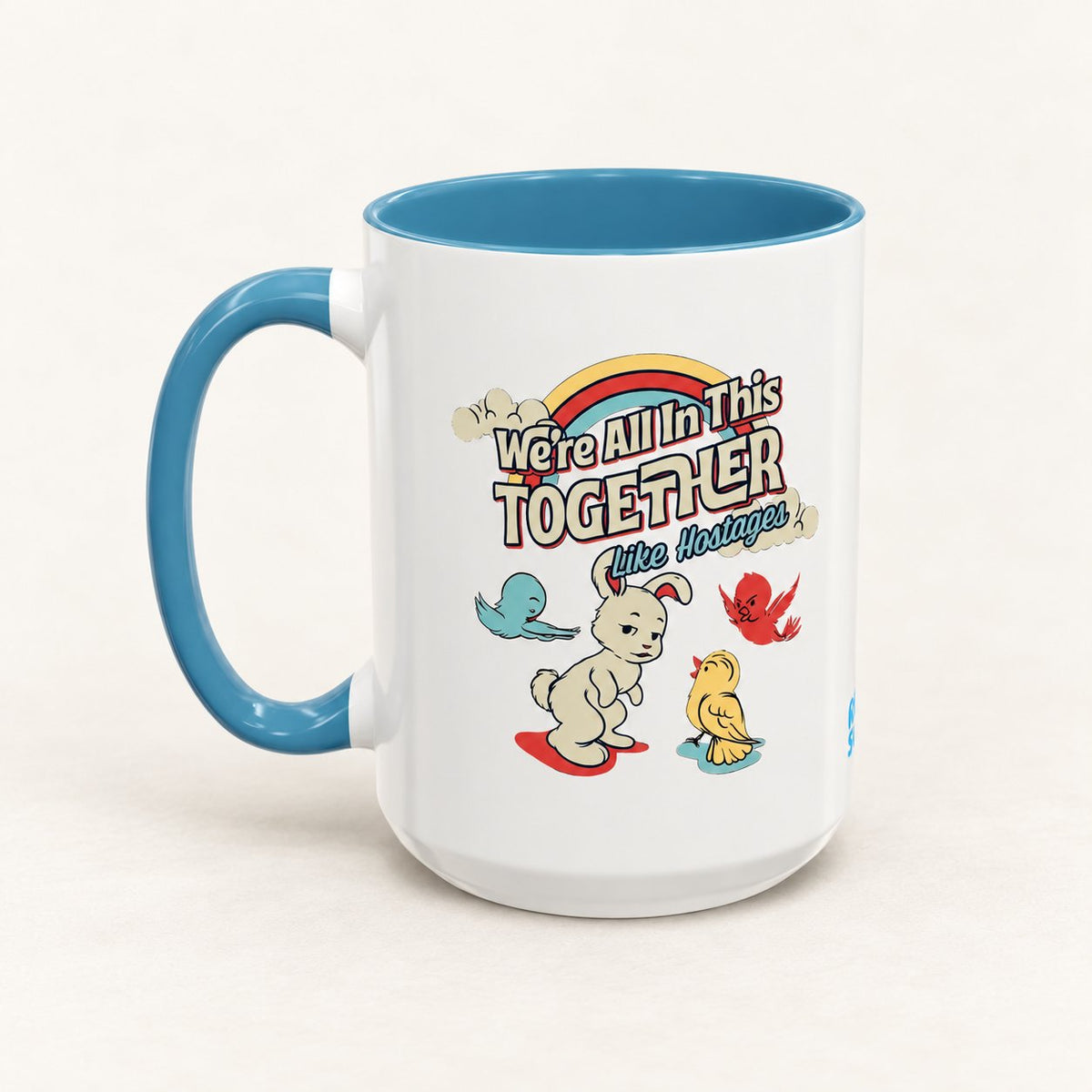 We’re All in This Together Like Hostages Coffee Mug on warm off-white background