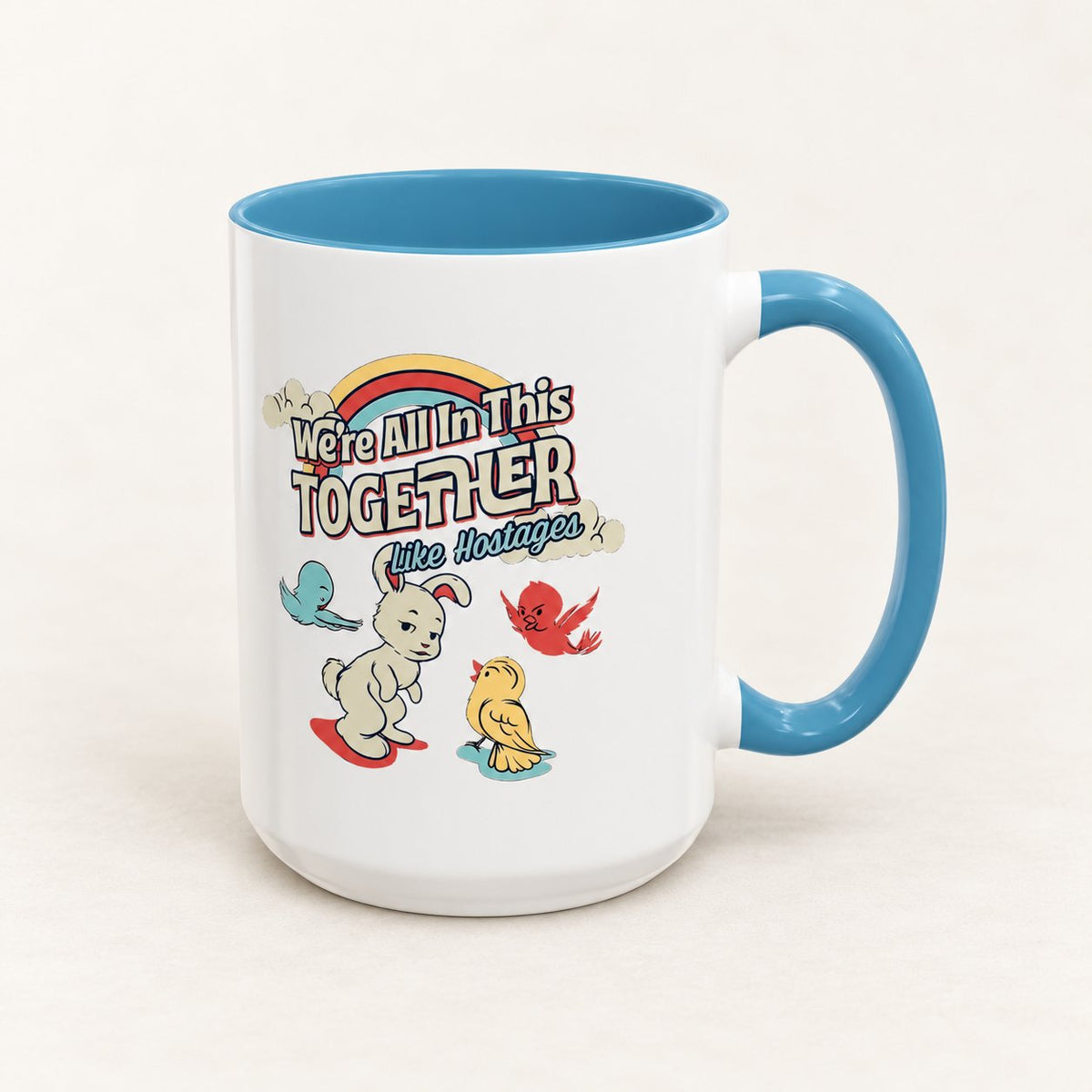 We’re All in This Together Like Hostages Coffee Mug on warm off-white background