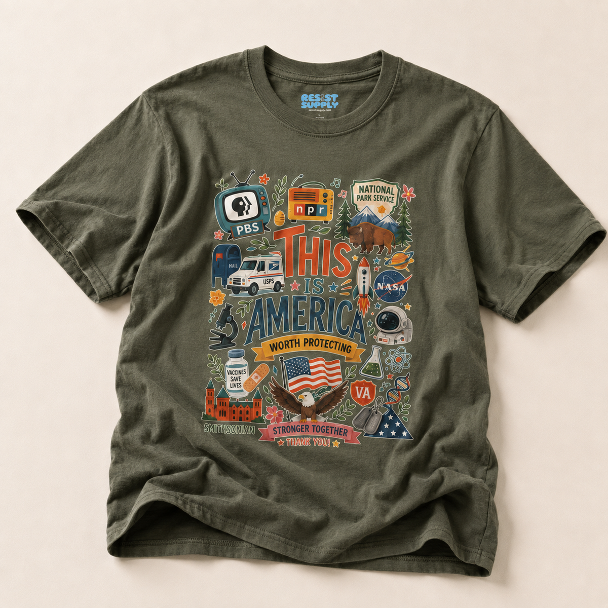 This Is America Graphic T‑Shirt — Patriotic USA Icons Tee (PBS, NPR, NASA)