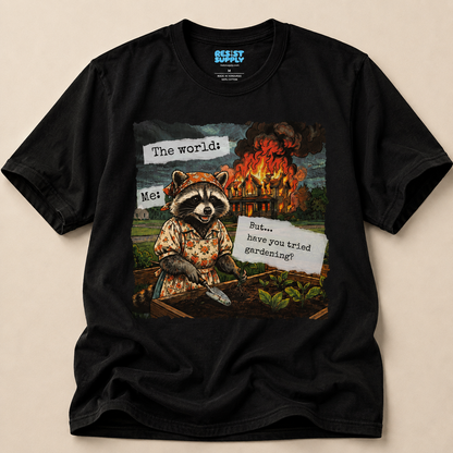 Raccoon Watching House Burn T‑Shirt — “The world: Me: But…have you tried” Funny Dark Humor Tee