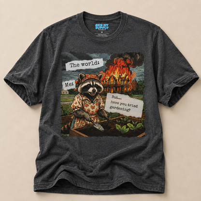 Raccoon Watching House Burn T‑Shirt — “The world: Me: But…have you tried” Funny Dark Humor Tee