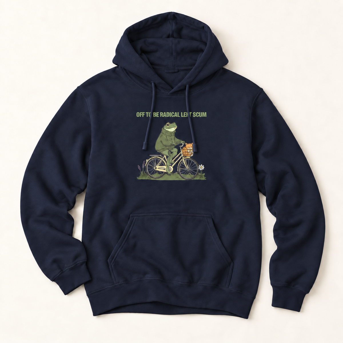 A navy blue pullover hoodie with a front kangaroo pocket and drawstring hood, featuring a graphic of a green frog riding a bicycle with the text 'OFF TO BE RADICAL LEFT SCUM' above it, displayed on a light beige background.