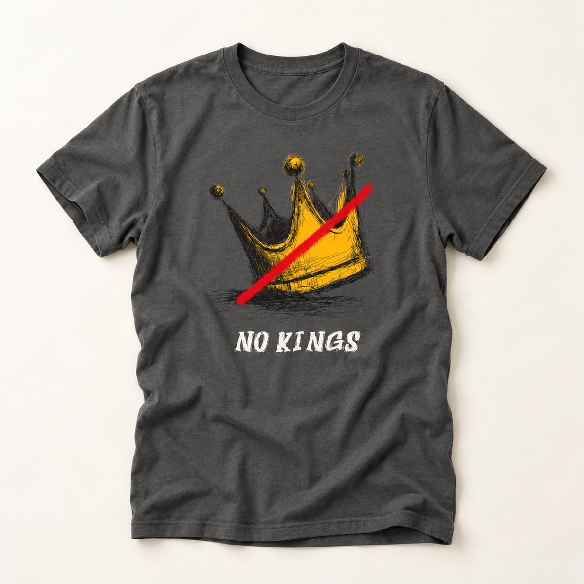 A dark gray crewneck t-shirt featuring a graphic of a gold crown with a red diagonal slash and the text 'NO KINGS' printed below in white.