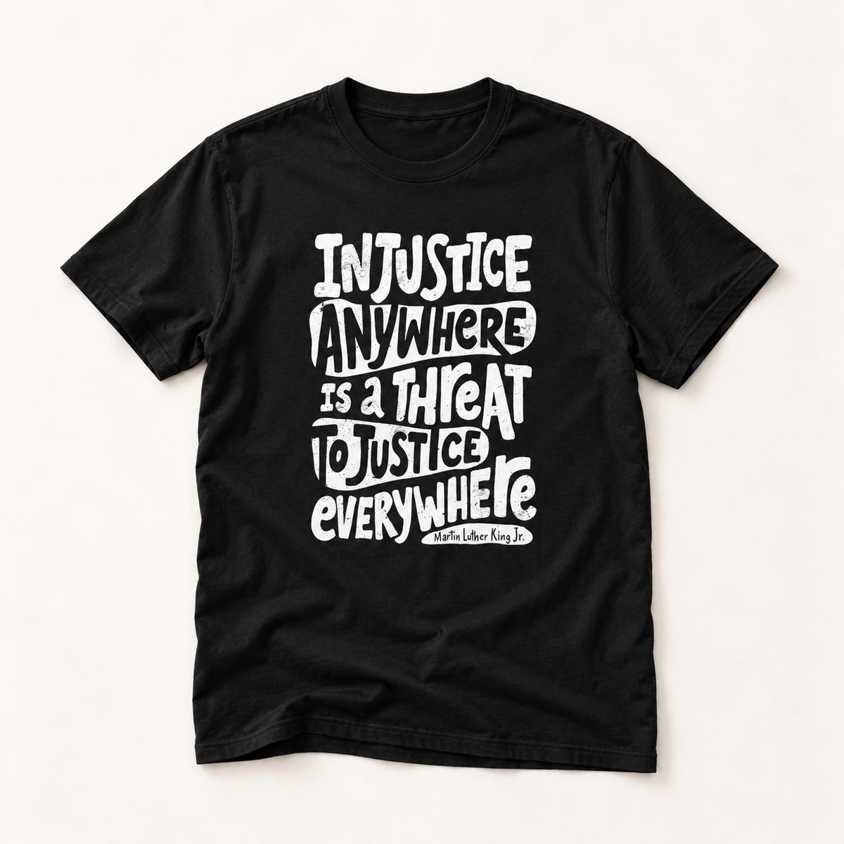 T-Shirt — “Injustice Anywhere Is A Threat To Justice Everywhere” Quote Tee