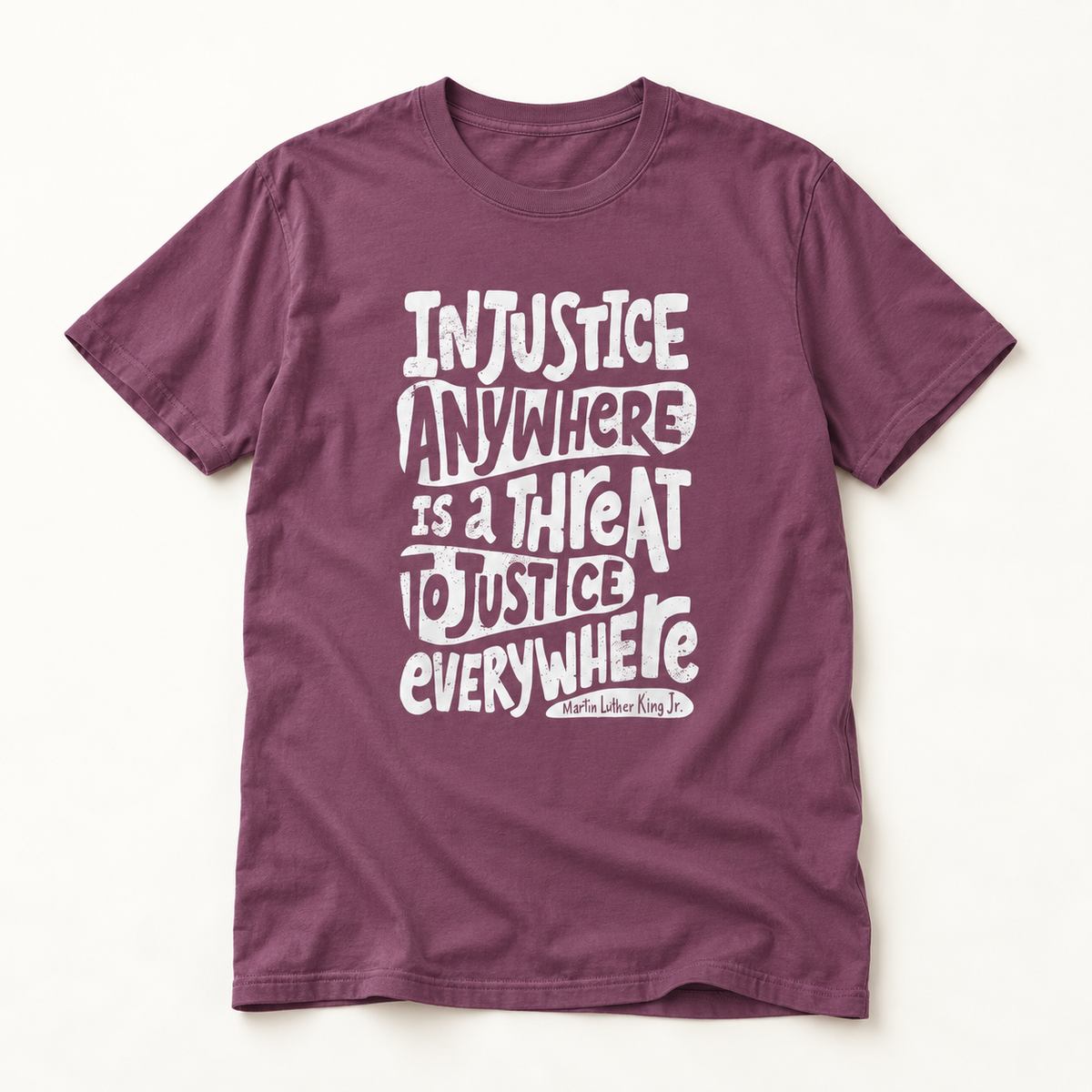 T-Shirt — “Injustice Anywhere Is A Threat To Justice Everywhere” Quote Tee