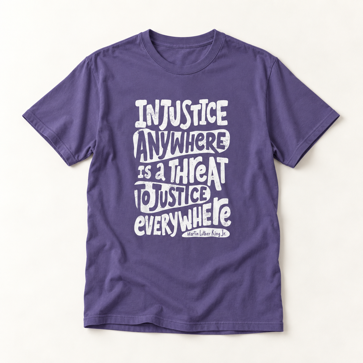 T-Shirt — “Injustice Anywhere Is A Threat To Justice Everywhere” Quote Tee