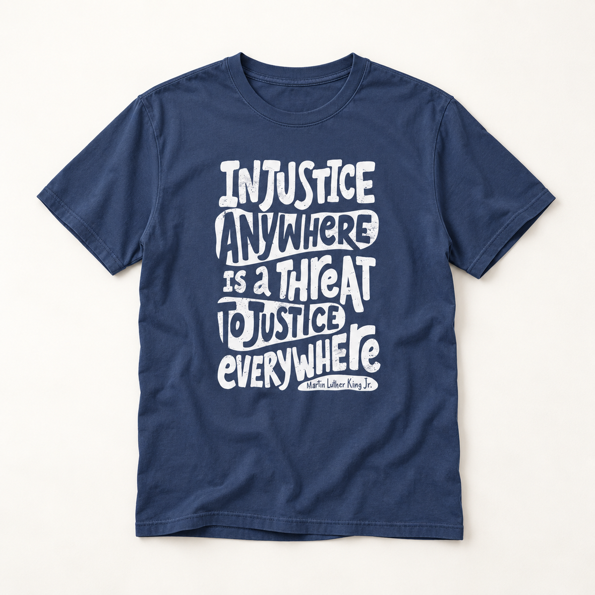 T-Shirt — “Injustice Anywhere Is A Threat To Justice Everywhere” Quote Tee