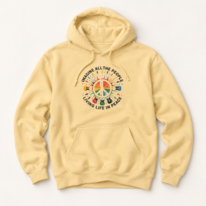 A pale yellow pullover hoodie with a colorful peace sign graphic on the chest, featuring the text 'IMAGINE ALL THE PEOPLE LIVING LIFE IN PEACE' and small illustrations of musical instruments and people.