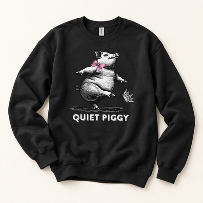 A black crewneck sweatshirt featuring a graphic of a pig wearing sunglasses and a pink bow tie, with the text 'QUIET PIGGY' printed below, displayed on a light beige background.